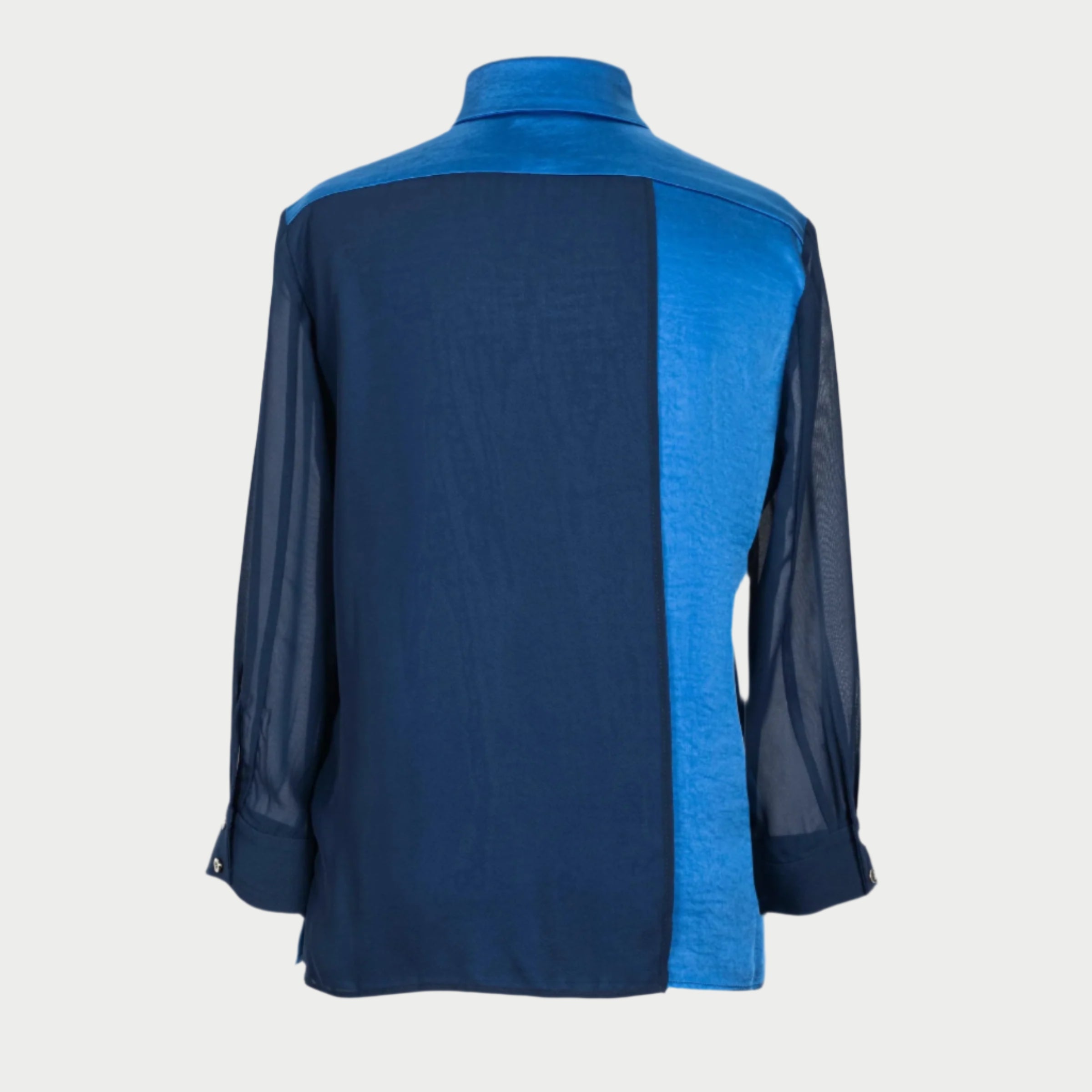 the aliferous shirt in royal blue by inlarkin featuring a back contrasting fabric flap detail that adds movement and style with every step