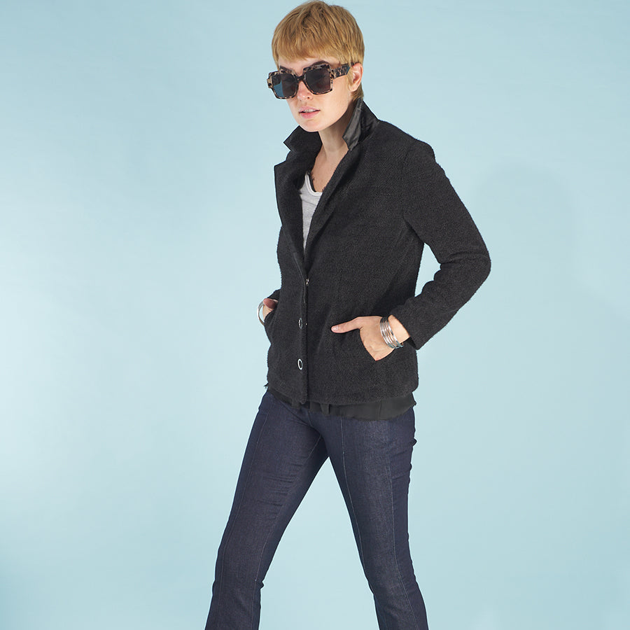 the austin blazer by inlarkin in black front view with signature large snaps, pockets and popped trimmed collar paired with the sublime jean by inlarkin