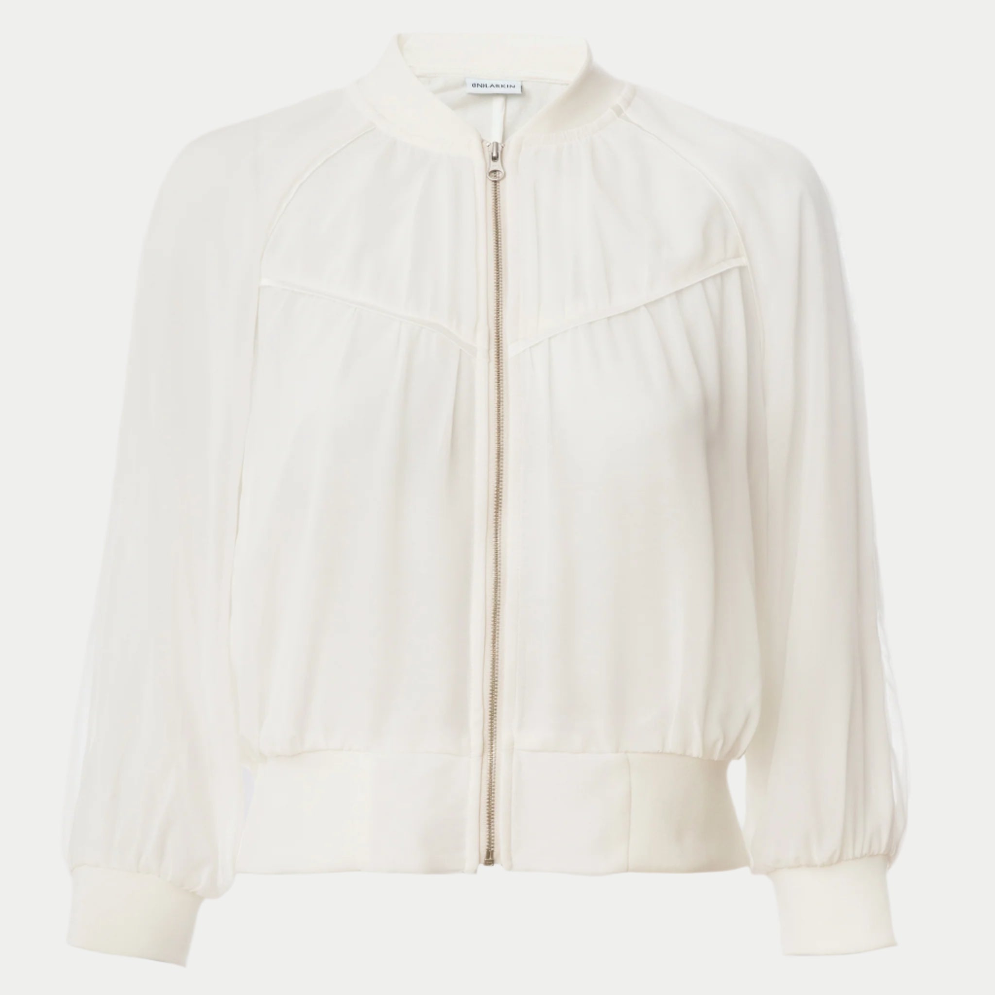 beauty bomber jacket in white by inlarkin front view showing the piping and zipper detail