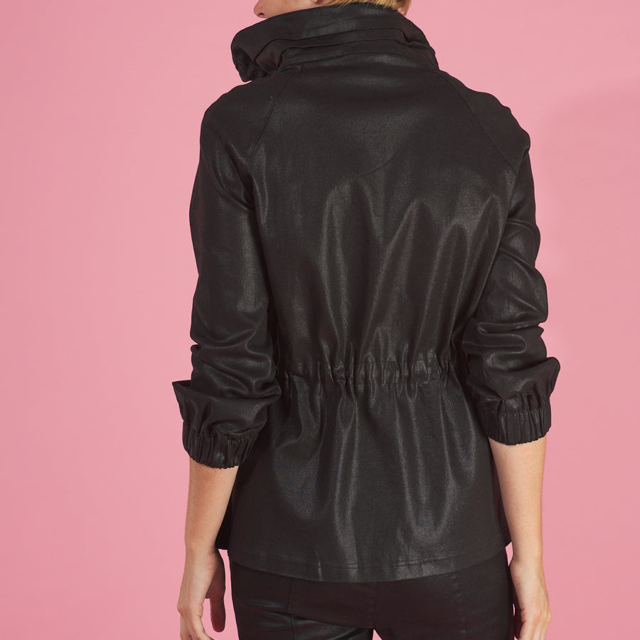 the brooke breaker in black back view by inlarkin with a drawstring waist and ruched drawstring collar