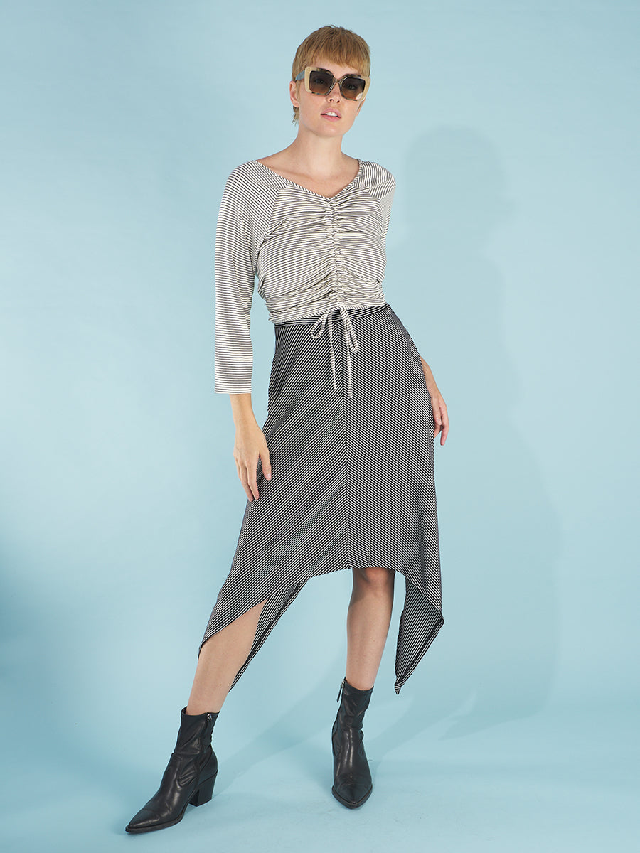 the drunk stripe dress by inlarkin in black stripe with the front knot cardigan in white stripe worn in reverse with the drawstring gathered and tied in the back