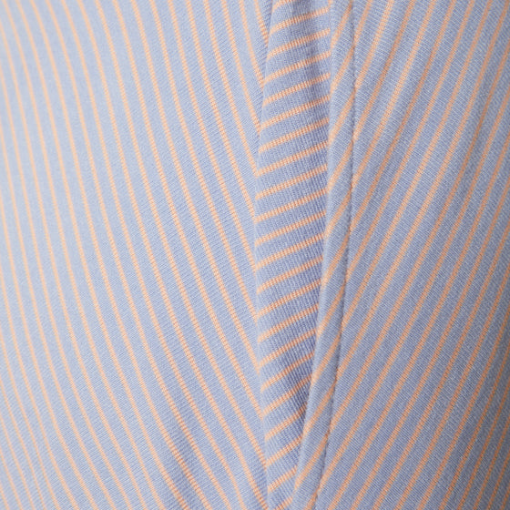 detail view of the drunk stripe dress in lilac pocket opening