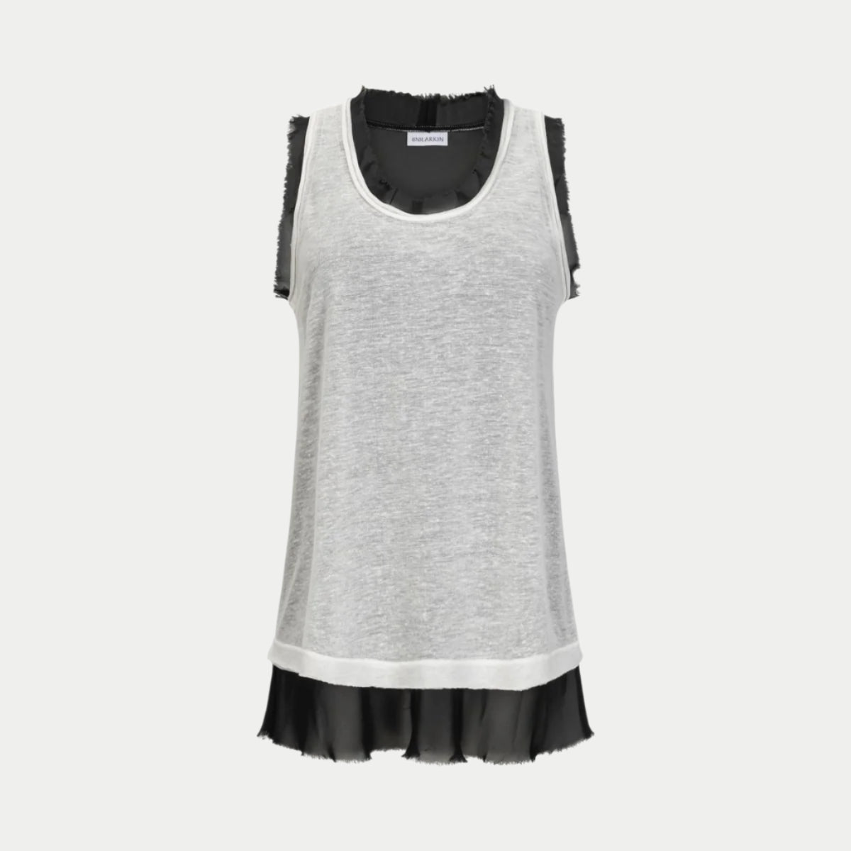 front view of the glasswing shell 2.0 in black with white by inlarkin showing the detailed raw edge hem at neckline and arm holes