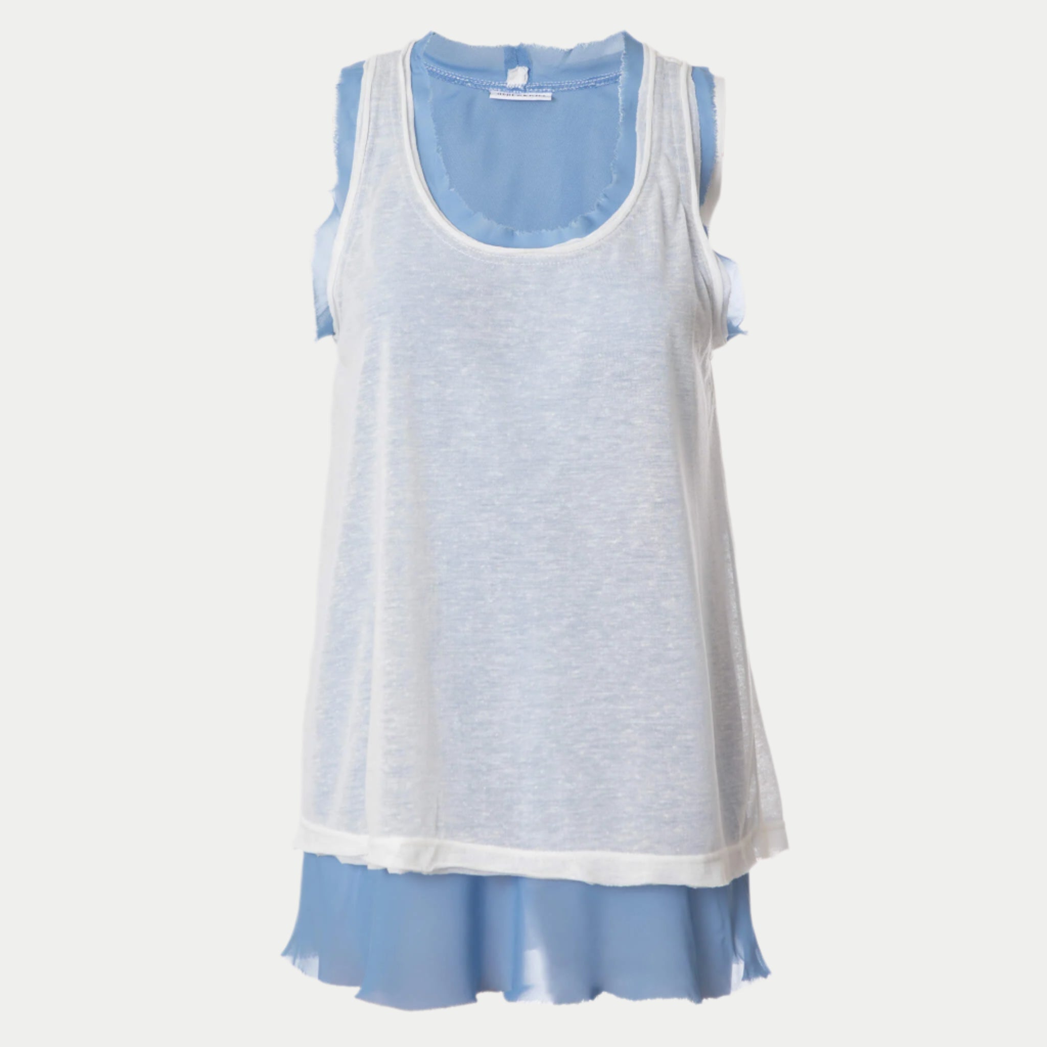 front view of the glasswing shell 2.0 in perry blue by inlarkin showing the detailed raw edge hem at neckline and arm holes