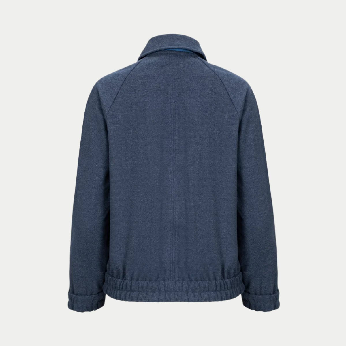 lady bomber jacket back view in indigo by inlarkin showing gathered hem and back vent.