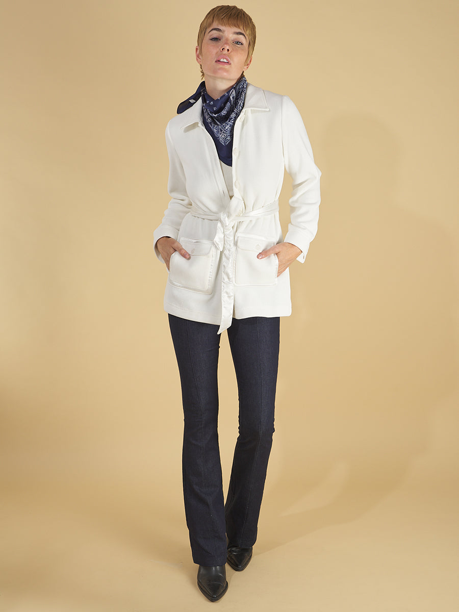 shirt jacket by inlarkin in white front view featuring the front sateen patch pockets, collar and sea glass buttons paired with the sublime jean