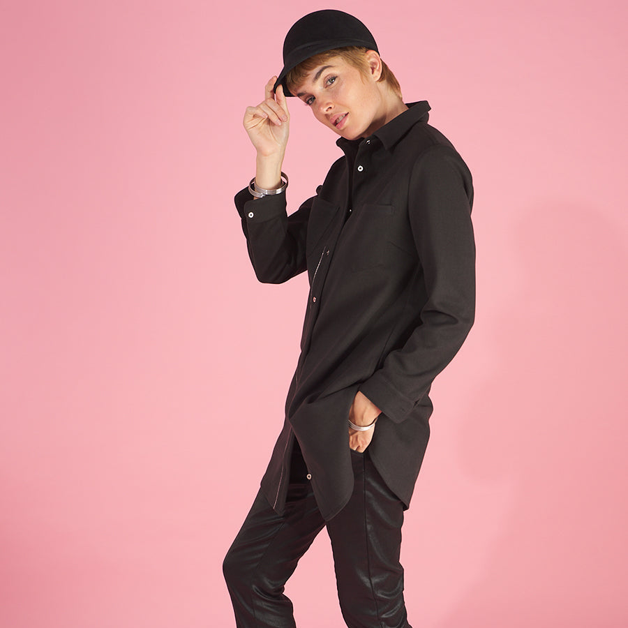 the sy shirtdress by inlarkin in black side view featuring the silver peek-a-boo buttons, collar, cuffs and new felted stretch fabric