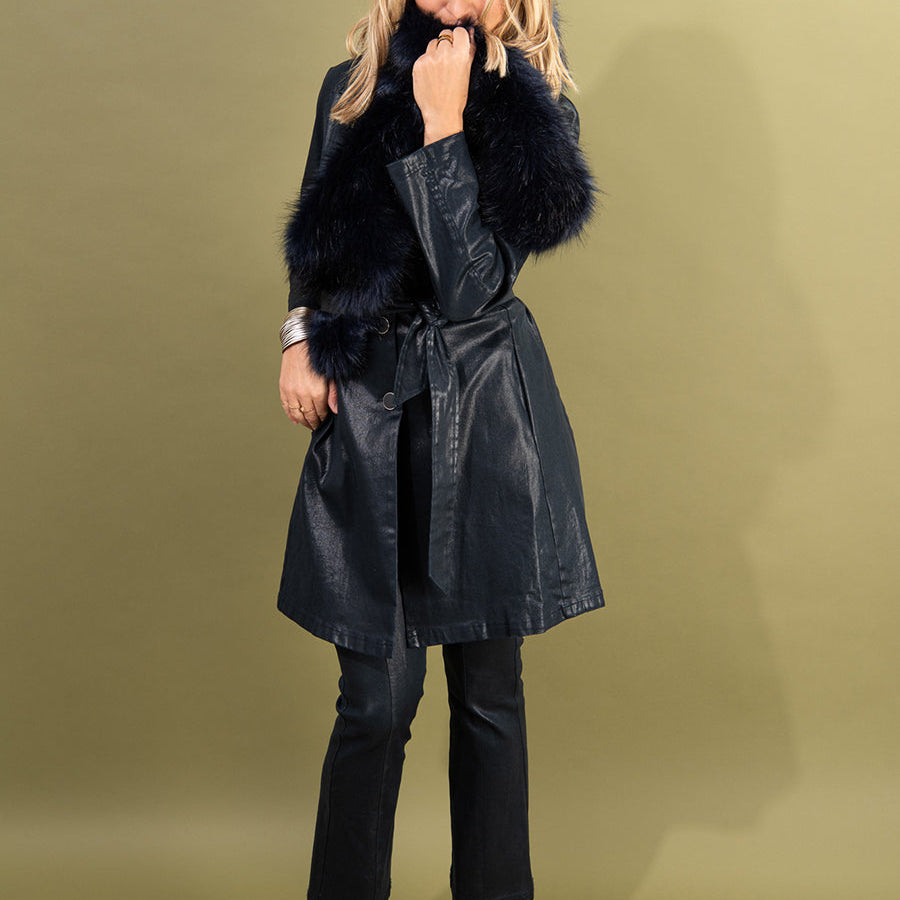 the toni trench coat by inlarkin in navy front view showing the high gloss fabric, side seam pocket and belt