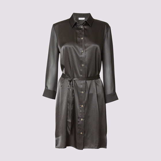 a front view of the aliferous shirt dress in black by inlarkin showing the length and mid thigh and button front closure