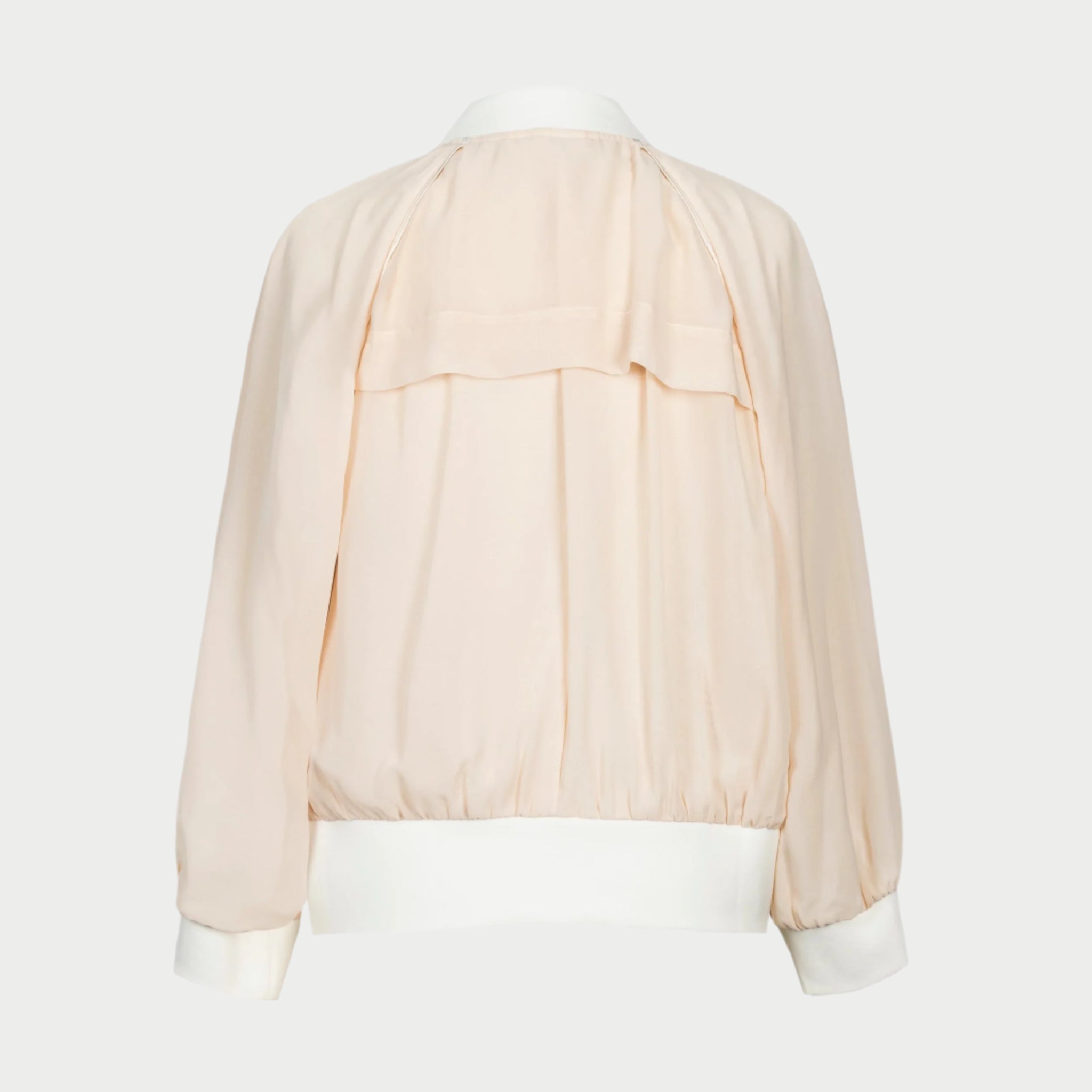 invisible mannequin image of the beauty bomber jacket in cream by inlarkin back view