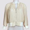beauty bomber jacket in white by inlarkin front view showing the piping and zipper detail