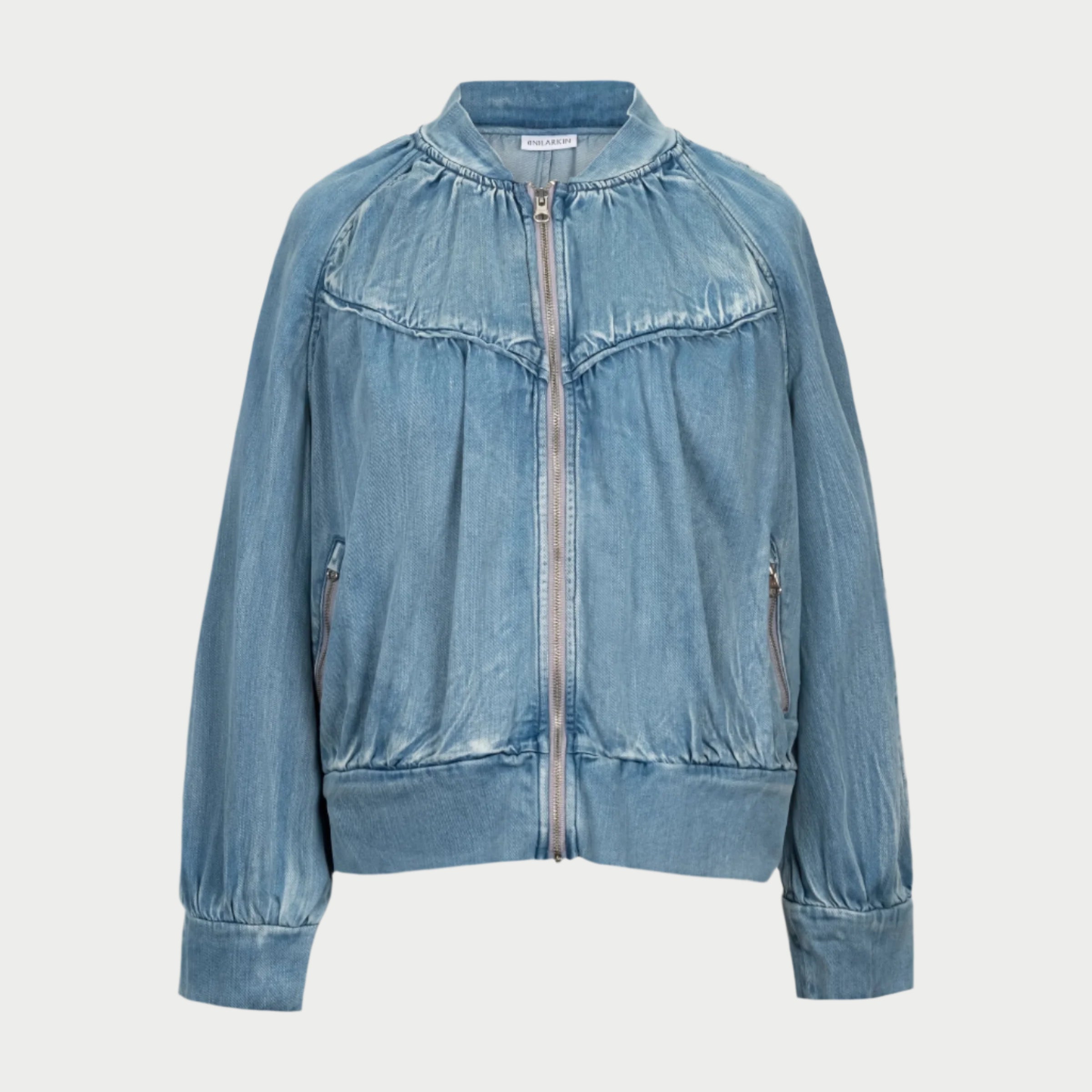 the boy bomber in japanese denim by inlarkin front view showing the cropped jacket length, subtle pockets and modern design