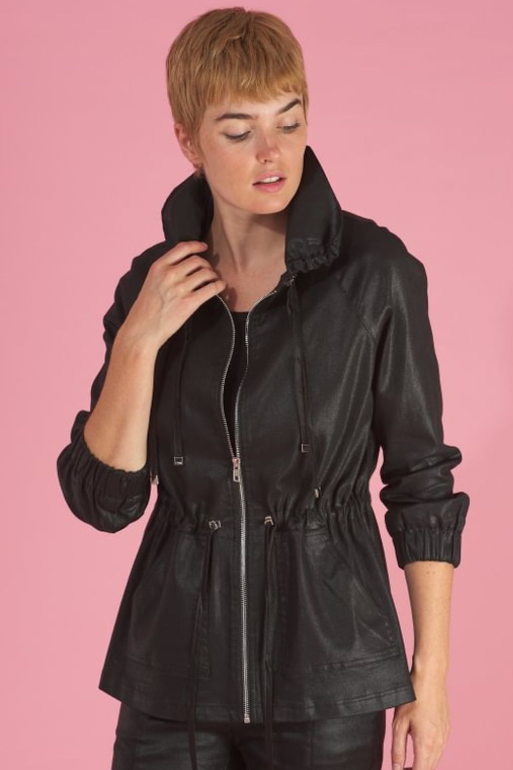 the brooke breaker by inlarkin in black front detail view showing the ruched collar with drawstrings, waist drawstring and front pockets