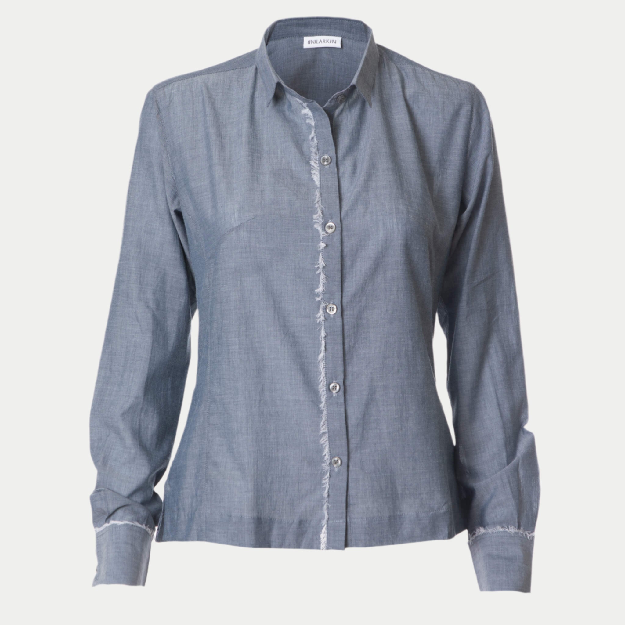 front view of the blue classic updated chemise shirt by inlarkin showing the darts at bust detail, full length sleeves and raw-edge placket down the center front and at cuffs in cotton chambray fabric