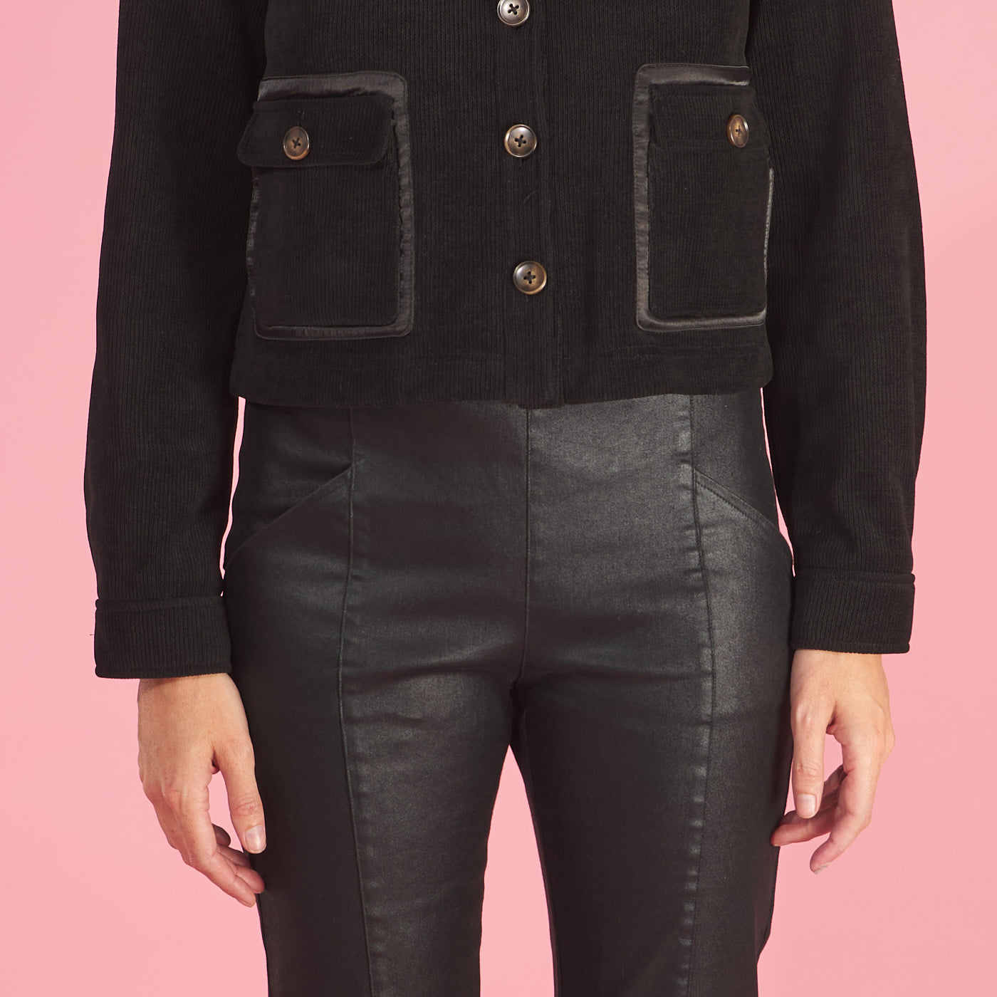 the cropped shirt jacket by inlarkin in black featuring a runway ready design that is a cropped silhouette crafted for modern elegance and petite proportions