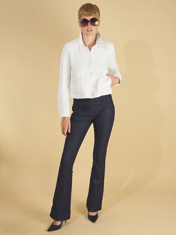 the cropped shirt jacket by inlarkin in white front view detail showing the collar, buttoned front and oversized pockets