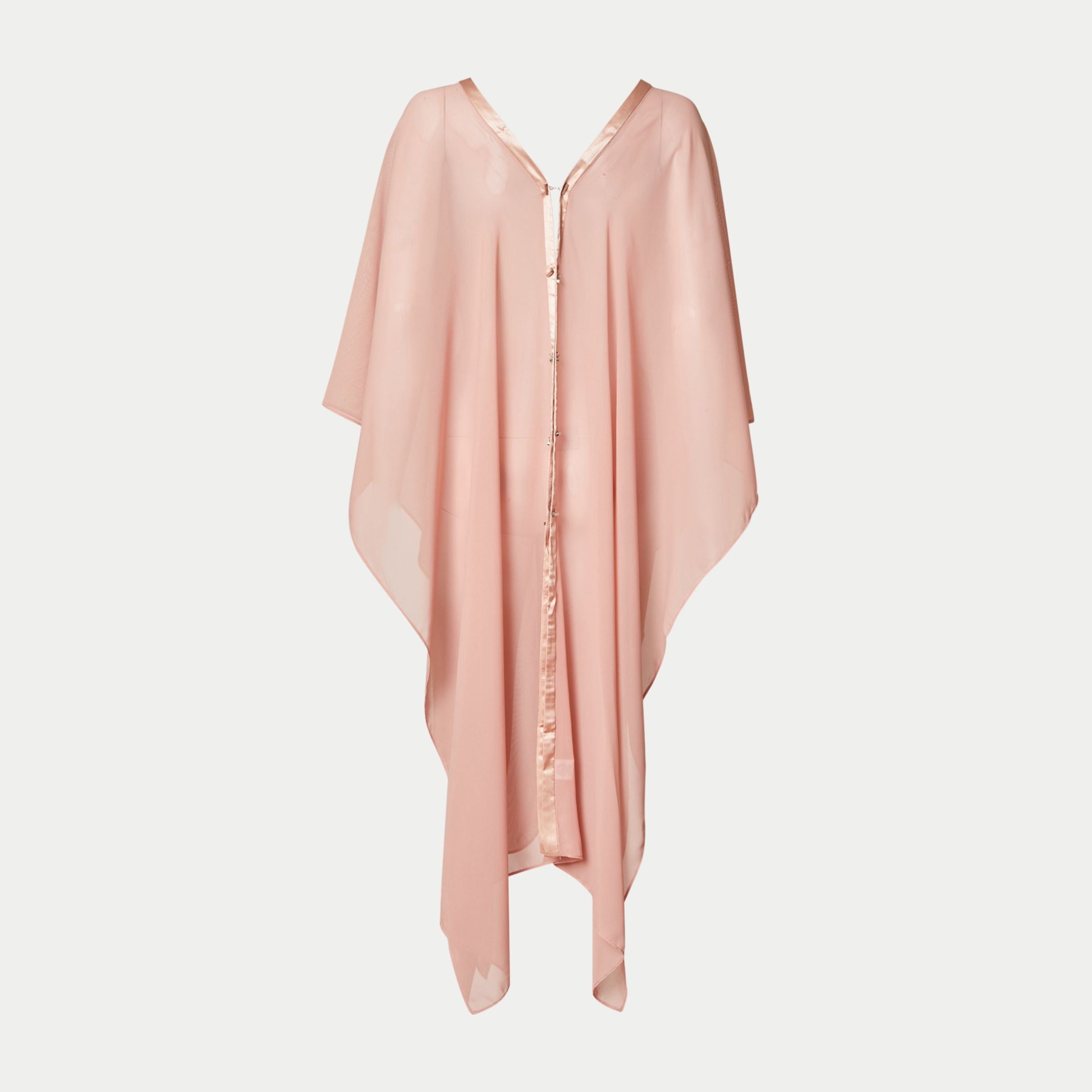 the dottie coverall long by inlarkin is a long coral caftan with baby silver buttons and contrasting matte shine fabric down the front has multiple styling options