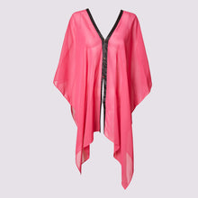  the dottie coverall short by inlarkin in fuchsia with contrasting black satin trim and baby silver buttons is a versatile caftan that has multiply styling options