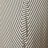 detail view of the drunk stripe dress in white by inlarkin pocket opening
