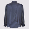 back view of the flight shirt by inlarkin in navy showing the wing detail and contrast sheer sleeves