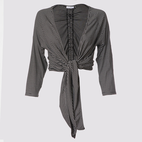 front knot cardigan in black by inlarkin showing the directional striped fabric, raglan sleeves and ease of wear
