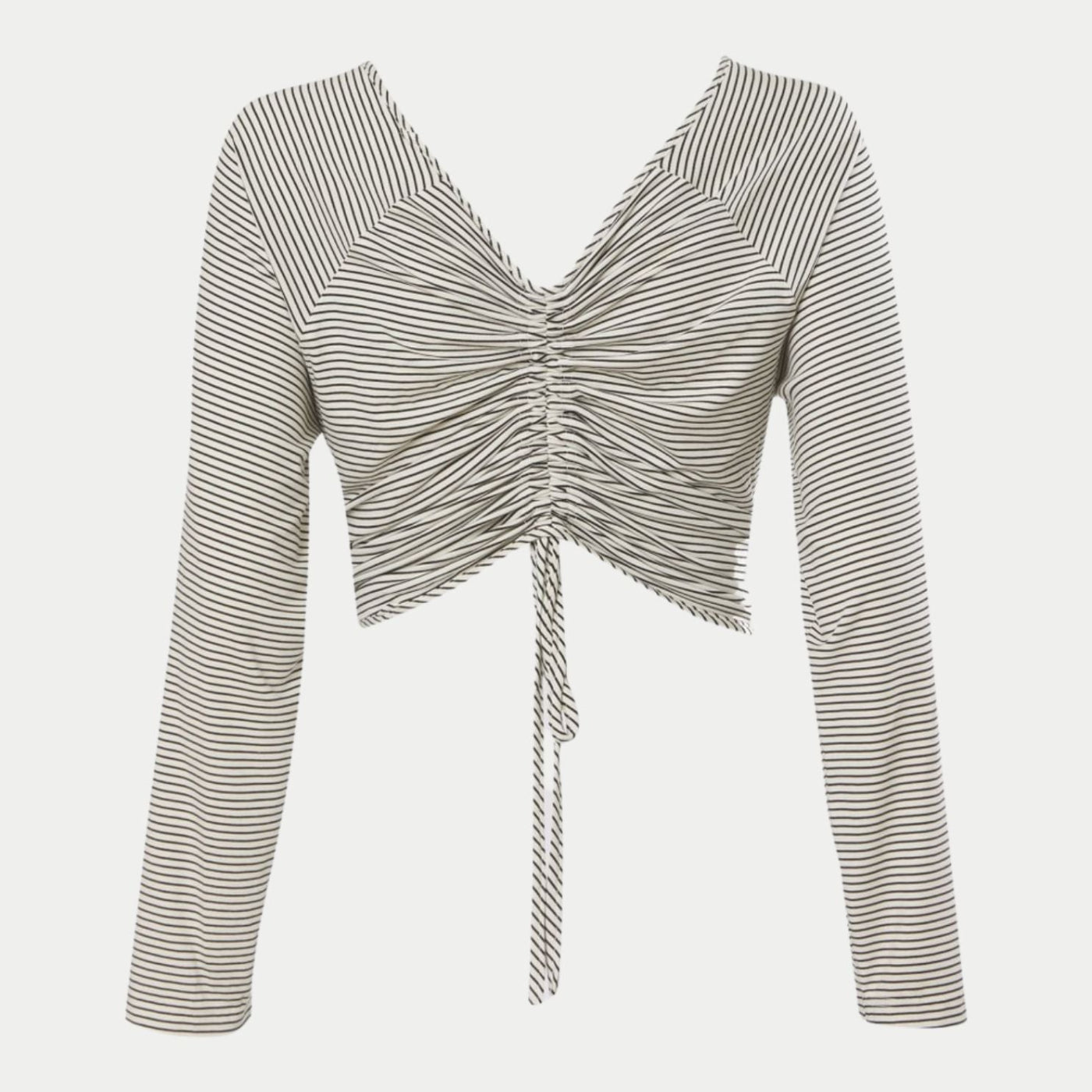 front knot cardigan in white by inlarkin showing the directional striped fabric, raglan sleeves and seam casing of the back