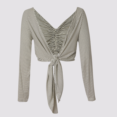 front knot cardigan in white by inlarkin showing the directional striped fabric, raglan sleeves and ease of wear