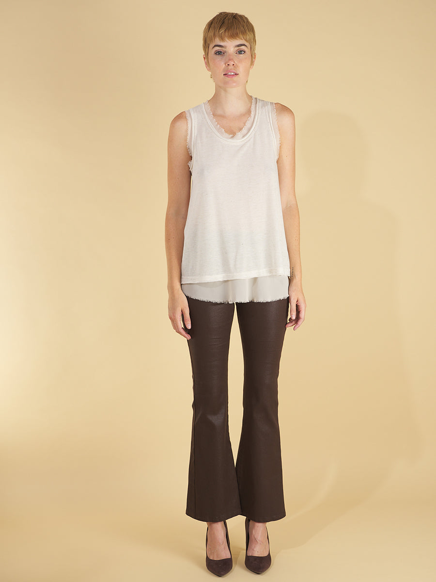 glasswing shell 2.0 by inlarkin in white front view featuring the raw edge hem and double layer tissue construction