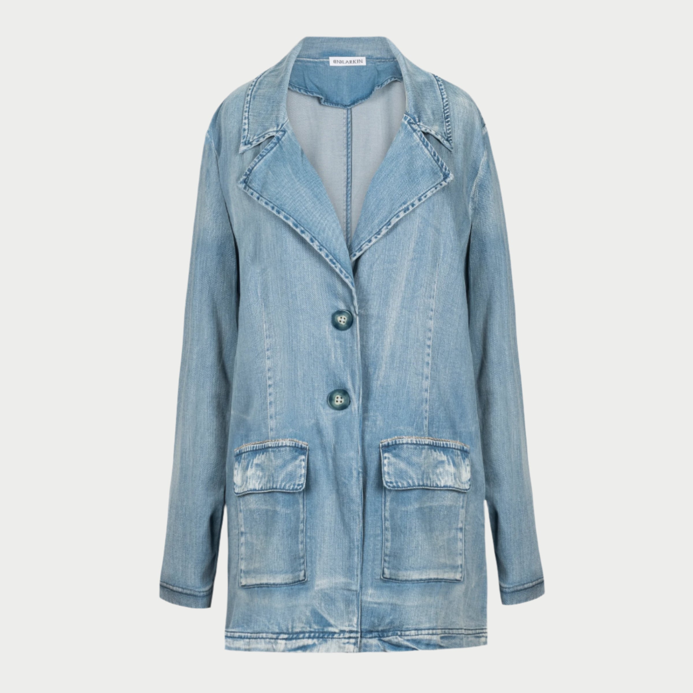 the inlarkin jane jacket in japanese denim white wash featuring a notched collar and front pockets with silver beading trim