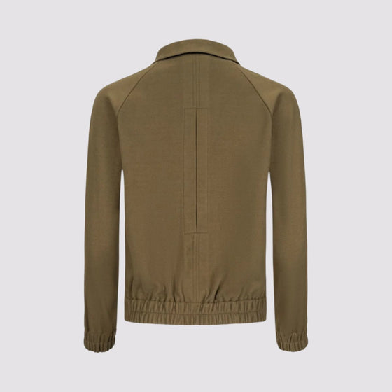 lady bomber jacket back view in olive by inlarkin showing gathered hem and back vent.