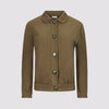 lady bomber jacket front view in olive by inlarkin showing the seaglass buttons, butterfly collar and gathered hem