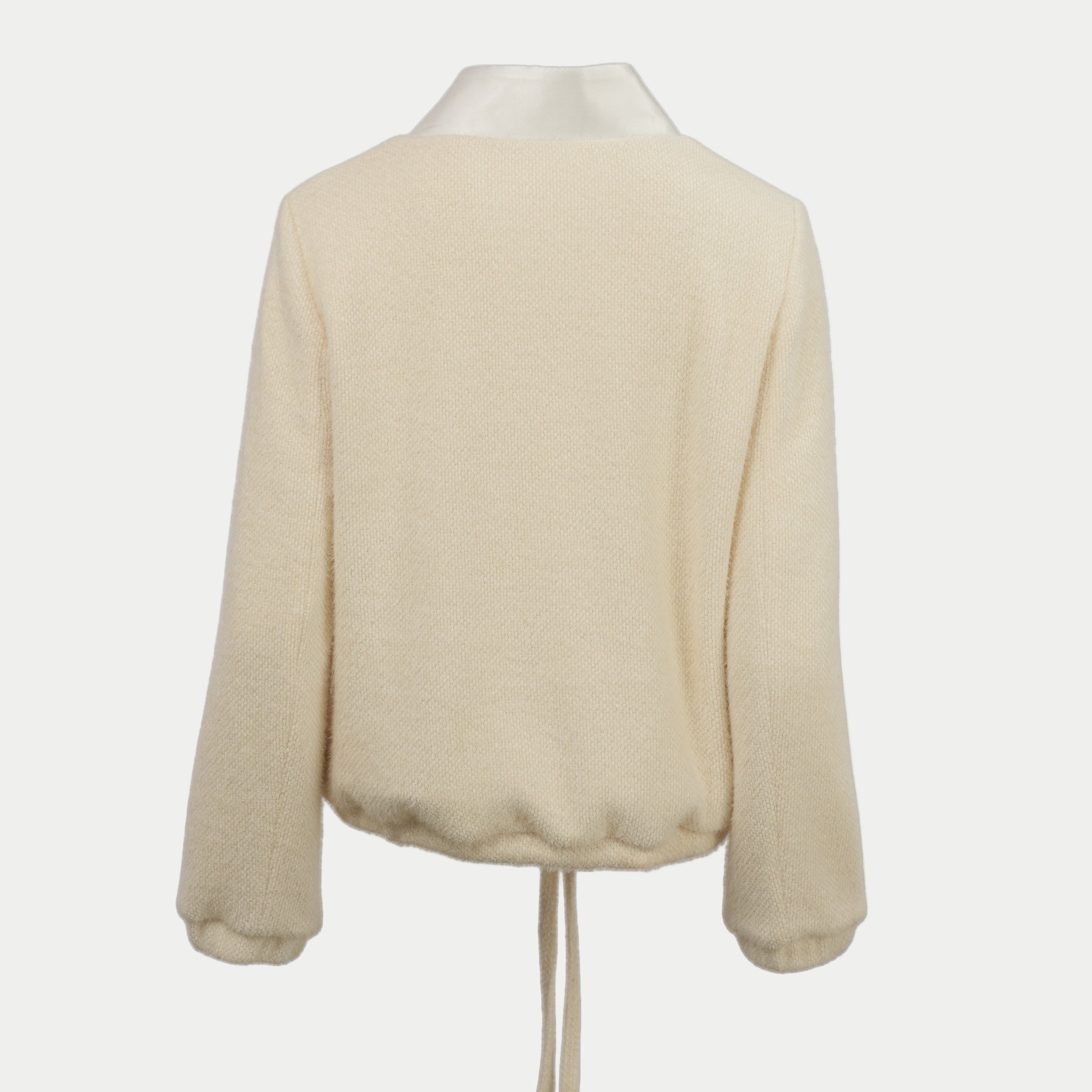 the larkin jacket in cream by inlarkin back view on an off-white background