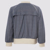 the back view of the lauren bomber in blue by inlarkin showing the back vent detail and sparkle fabric