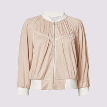  front view of the lauren bomber in coral by inlarkin showing the sparkle knit and front piping detail