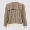 the back view of the lauren bomber in taupe by inlarkin showing the back vent detail and sparkle fabric