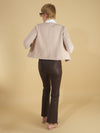 the oakley blazer by inlarkin in oat back view featuring the raw chiffon edged inverted collar and back seam