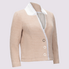 Oakley blazer in oat by inlarkin showing the raw-edged chiffon detail, signature large punch snaps, contrast sateen under collar and silky linen lining, front  angled detail view