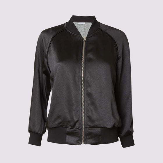 Front view of the olivia beauty bomber jacket in black showing the fabric sheen, zipper detail on front and pockets and piping trim