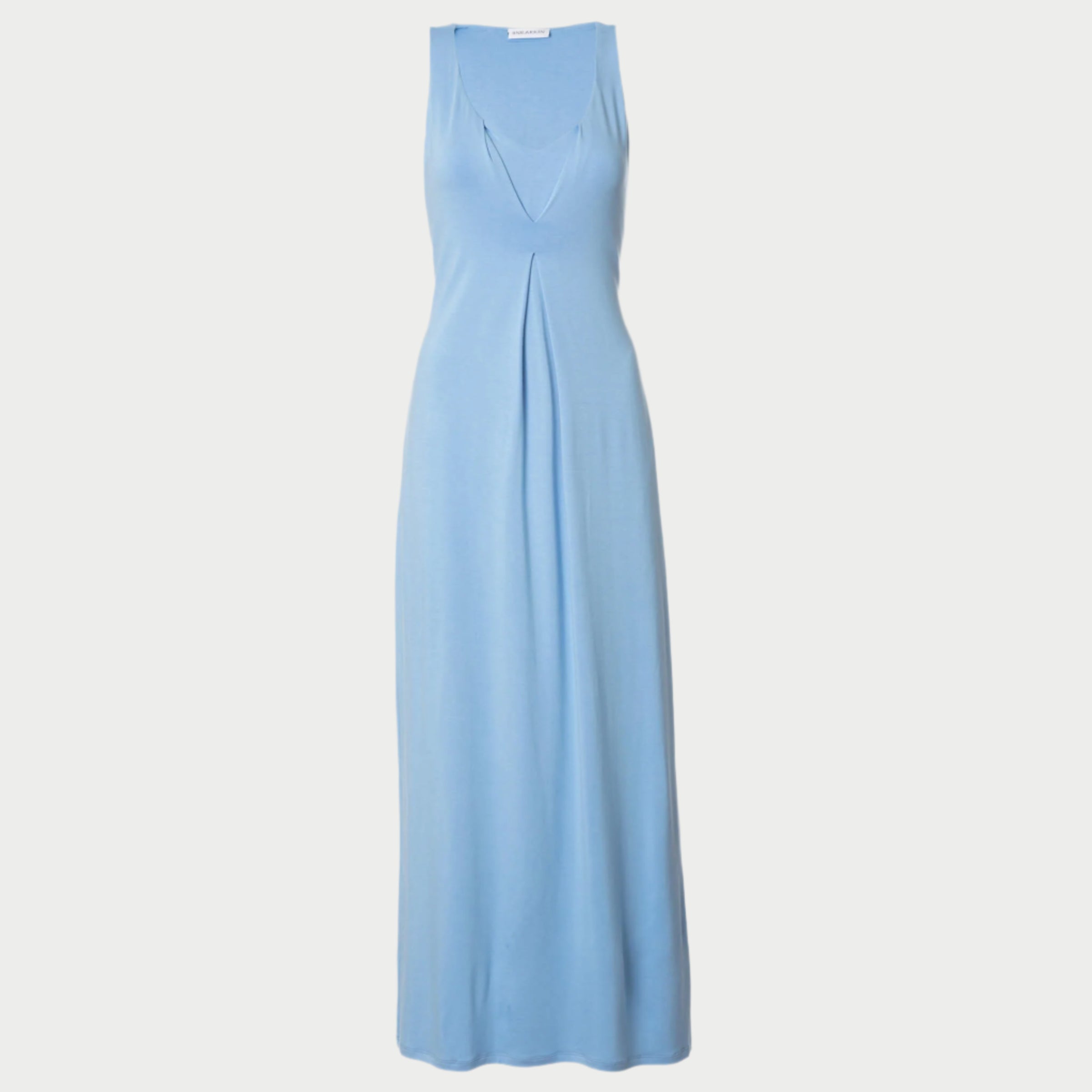 front view of the royal tuck dress in sky blue by inlarkin showing the v-neck and tuck detail in the front defining the chest and the bra shelf