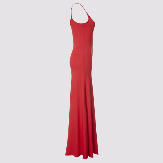 side full view of the sharyn dress in red by inlarkin showing the form fit, flared skirt, ankle length and thin tank straps