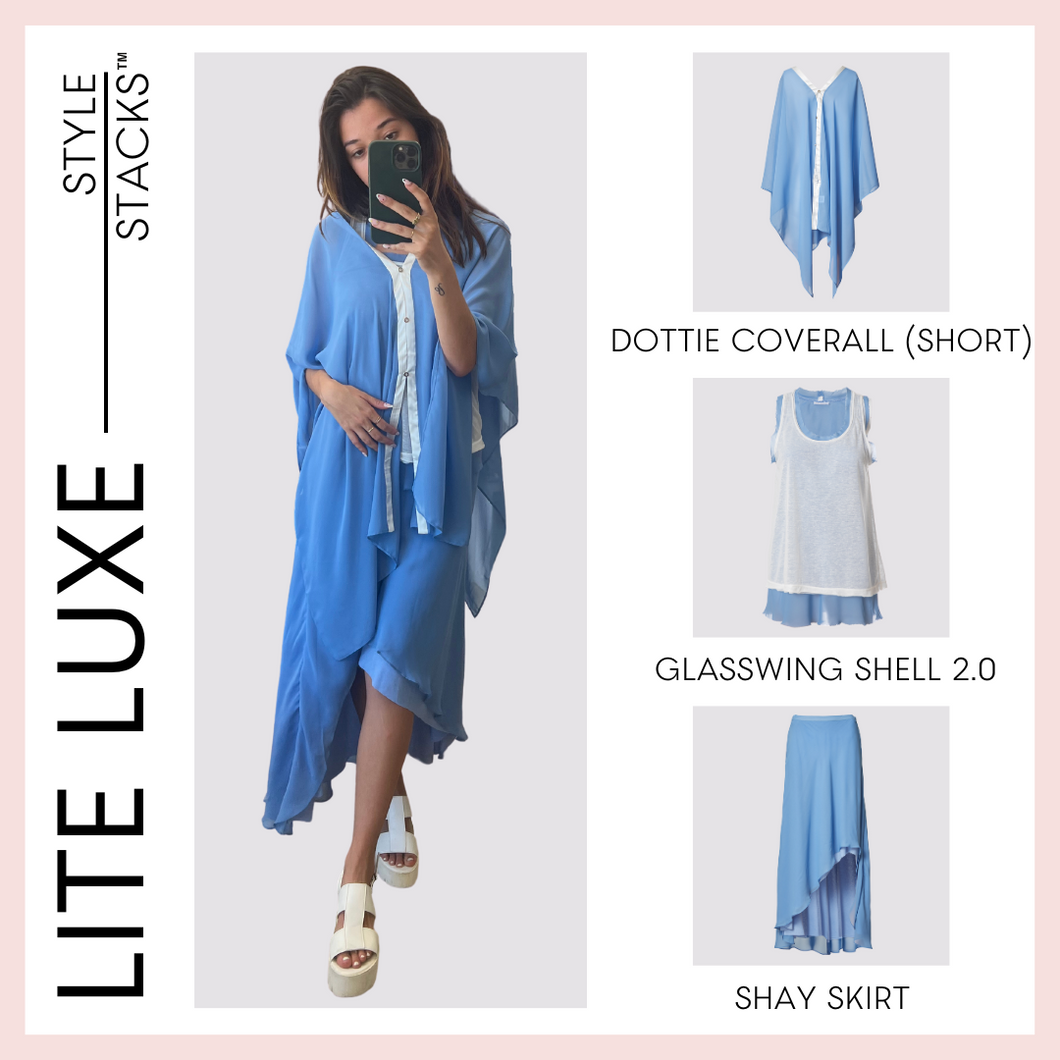  style stack image of the lite luxe collection by inlarkin with the dottie coverall short glasswing shell 2.0 and the shay skirt