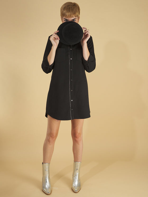 the sy shirtdress by inlarkin in black featuring a silver beaded chain trim, sateen facing, silver peek-a-boo buttons and new felted stretch fabric