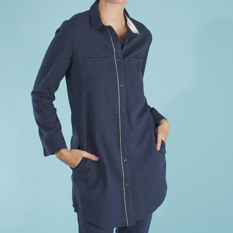 the sy shirtdress by inlarkin in indigo front detail view featuring a silver beaded chain trim, sateen facing, silver peek-a-boo buttons and new felted stretch fabric