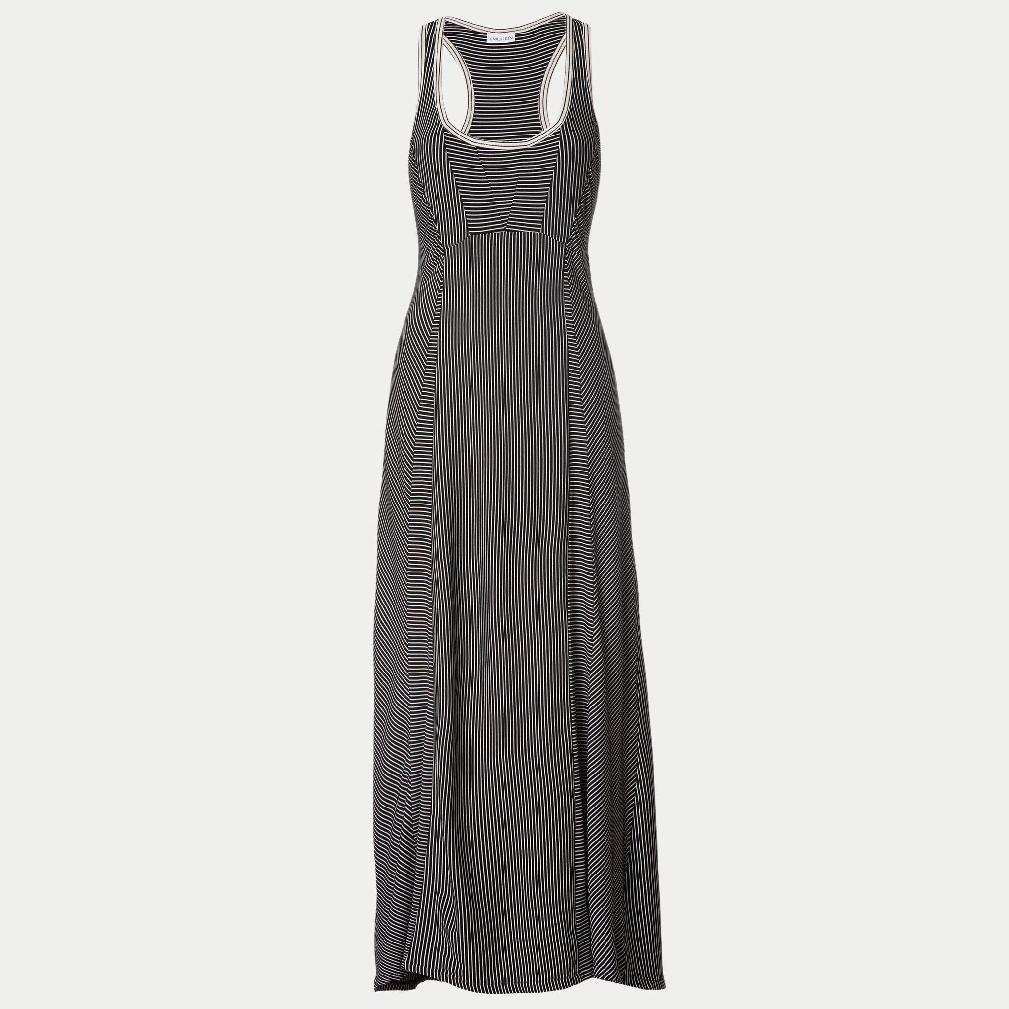 front view of the wingspan dress 2.0 in black by inlarkin showing the directional stripe detail, pockets and  empire top princess seams