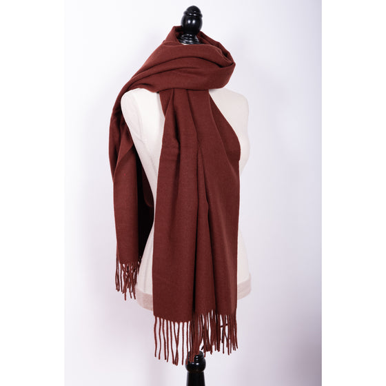blanket scarf in rust by inlarkin made with 100% wool with fringed ends