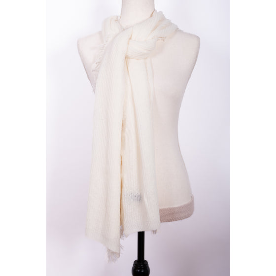 french fringe wrap in cream by inlarkin made with 100% wool with fine fringe along the sides