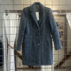 the herringbone blazer by inlarkin in black alpaca wool fully lined with oversized silver snaps and functional pockets