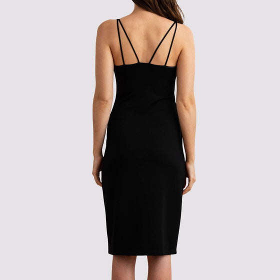 back view of the mariposa dress in black by inlarkin showing the form fit and strap detail in back