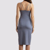 back view of the mariposa dress in blue by inlarkin showing the form fit and strap detail in back