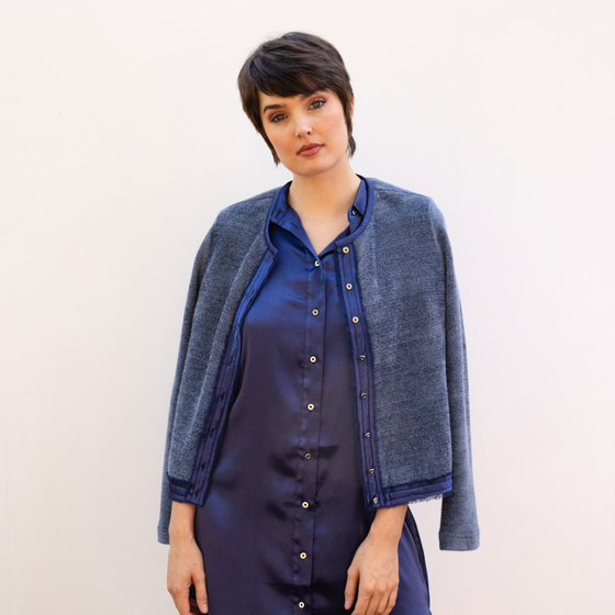 Blue button up mary sweater with frayed chiffon and sateen detail at the center front and hem by inlarkin